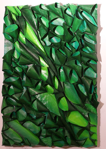 sculptural bas relief pod painting in various shades of green. Made of recycled cardboard tubes and acrylic paint.