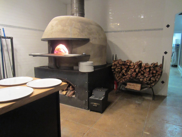 Wood burning pizza oven at Mother Dough. Umamimart.com