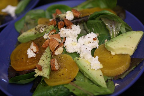 Baby Greens with Golden Beets, Goat Cheese, Avocado, and Chopped Almonds