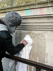 occupylsx: cleaning chalk graffiti off St Paul's Cathedral