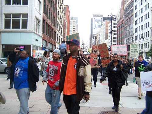 Youth and students were the majority of the crowd of thousands that marched through downtown Detroit as the part of the Occupation Wall Street movement. Grand Circus Park has been occupied since October 14, 2011. (Kris Hamel) by Pan-African News Wire File Photos