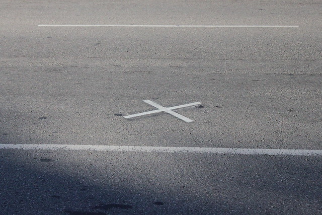 The spot where the second bullet hit John F. Kennedy at Dealey Plaza in Dallas on November 22nd, 1963