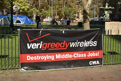 Better look at the Verizon parody banner.  This city had a whole labor strike and protest by Verizon workers.