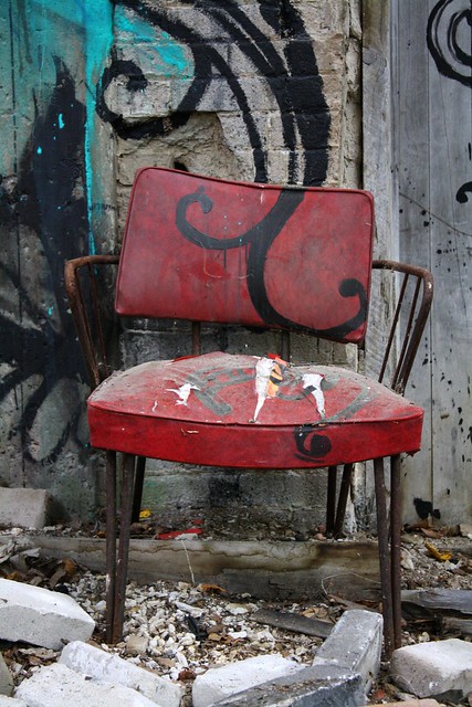 ...and a red leather chair have been incorporated into the mural...