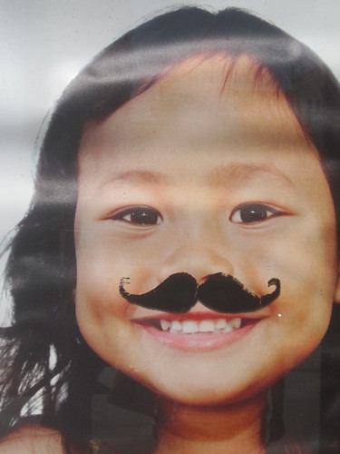 Little Girl with a Moustache