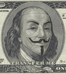 Benjamin Franklin $100 bill portrait with Guy Fawkes mask