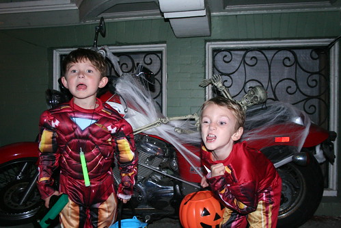 Walker and Jonty make scary faces in front of the spooky motorcycle rider