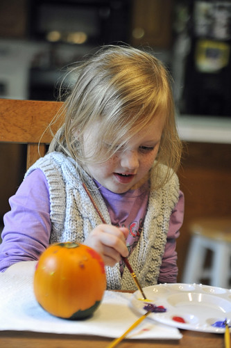 224 Abby painting a pumpkin