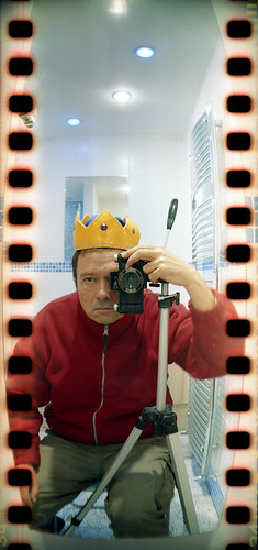 reflected self-portrait with Sprocket Rocket camera and yellow crown by pho-Tony