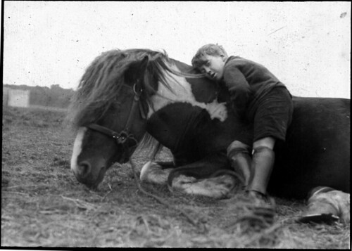 Horse and boy lying down by Tyne & Wear Archives & Museums