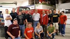Students from Region Ten Technical High School in Brunswick stand in front of the Ford F-150 pickup truck donated to the school by Hancock Lumber.