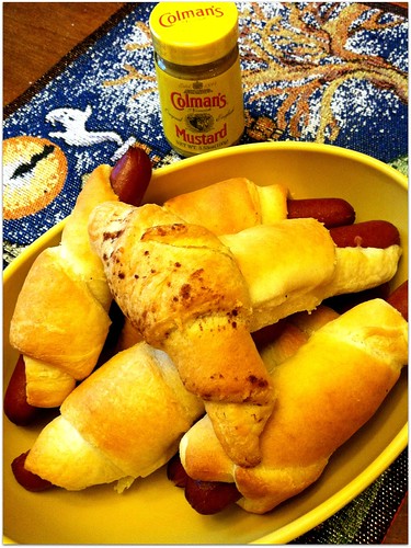 Low fat hot dogs wrapped in crescent rolls and dipped in Coleman's mustard