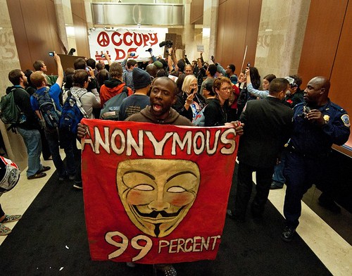 Protesters from Occupy DC, crash into the lobby of the Victor Building at 750 9th Street in Washington DC