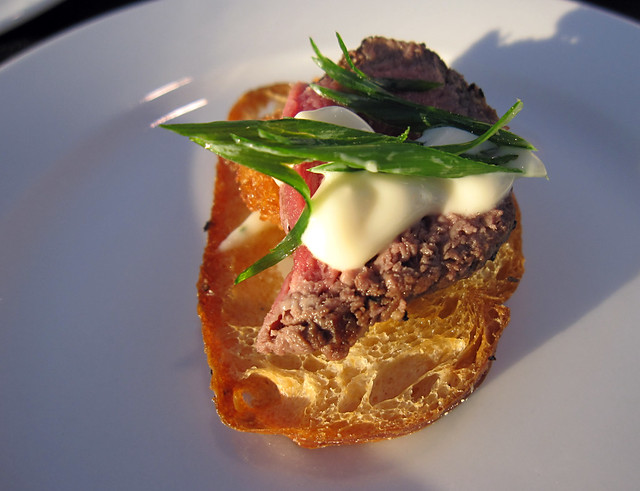 Pan seared beef, crab cake, tarragon on crostini from The Beach House