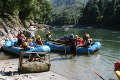 Locals and a fish trap on the Kameng river Adventure rafting and Kayaking trip