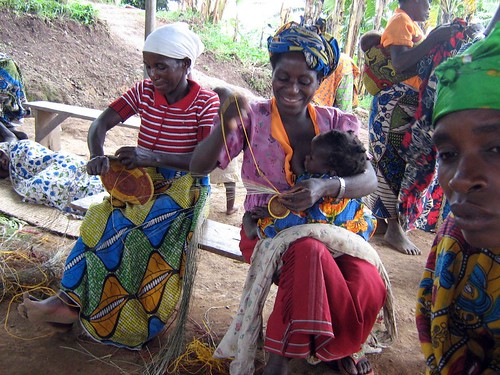 Batwa women weaving baskets