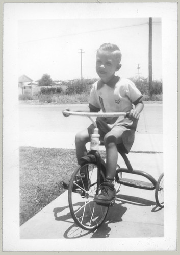 Boy on a tricycle
