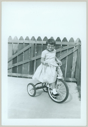 Child with tricycle