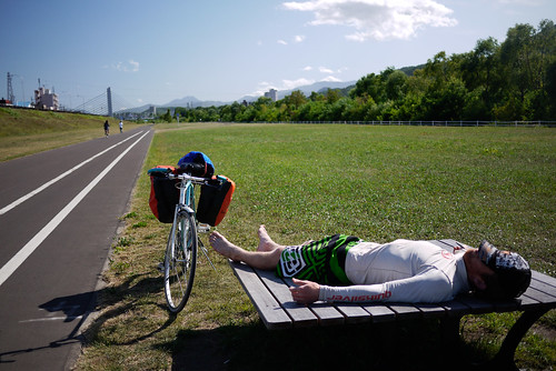 Cycling along the Toyohira River cycle path in Sapporo, Japan
