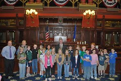 Rep. Ackert on the floor of the House of Representatives with students from Robertson Middle School during their class trip to the State Capitol 