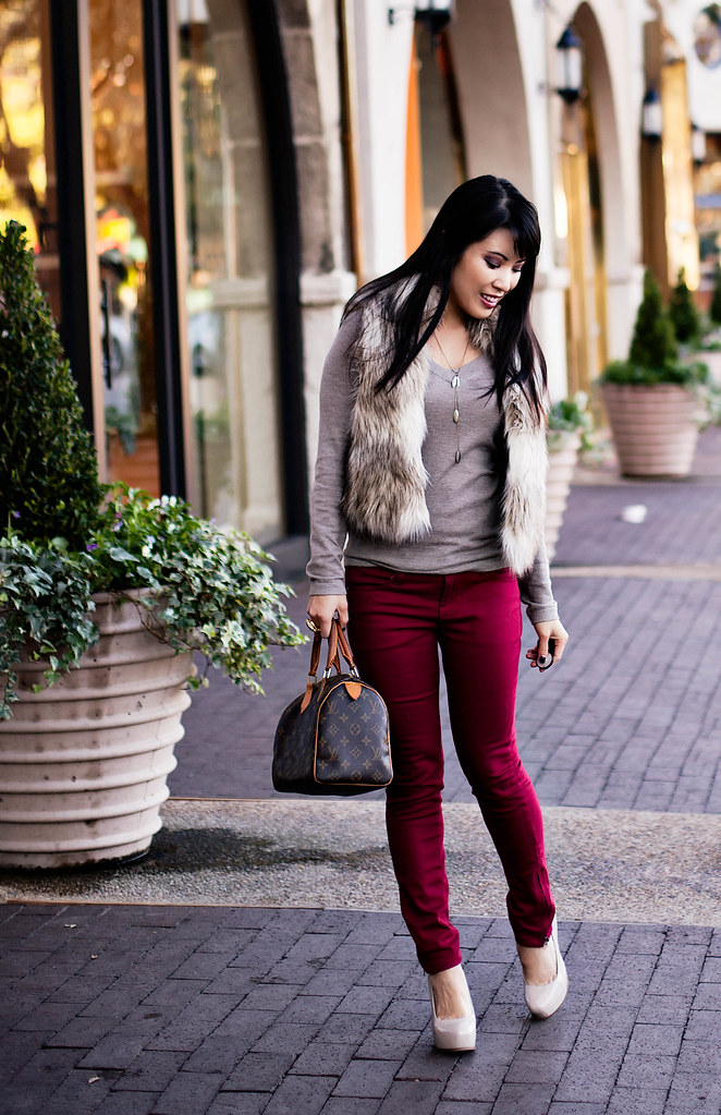 loft faux fur vest, gap taupe v-neck sweater, guess cascading necklace, louis vuitton speedy 25, sole society marco santi dash nude pumps, romwe street style gem arty ring, forever 21 red skinny pants