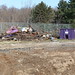 Purple debris in a purple dumpster