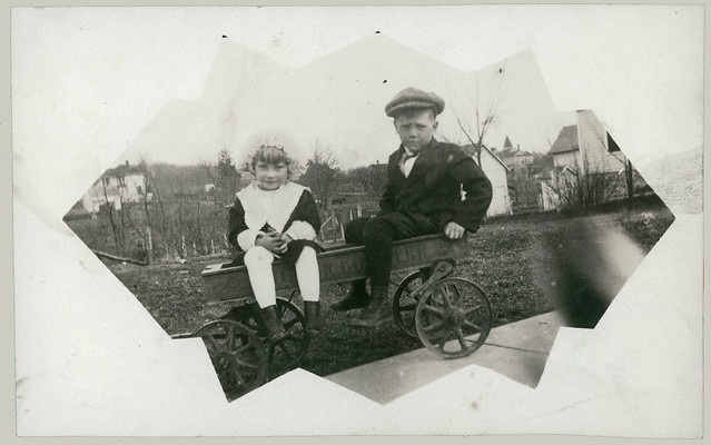 Two children in a wagon