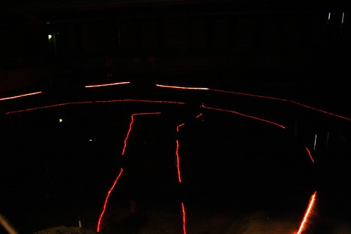 Red lights outline the remains below