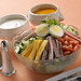 Garden salad topped with julienne of roast turkey, gourmet ham and roast beef served with hard boiled eggs, imported Swiss and cheddar cheese, with your choice of dressing.