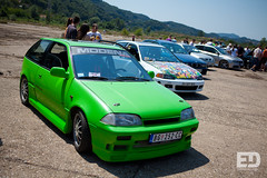 Green Suzuki Swift • <a style="font-size:0.8em;" href="http://www.flickr.com/photos/54523206@N03/6022930501/" target="_blank">View on Flickr</a>