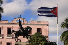 Camagüey, Parque Agramonte with Cuban flag and Agramonte monument