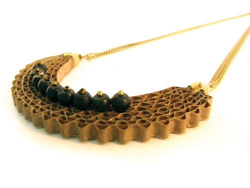 elegant cardboard semi-circle necklace with onyx stones and gold chain