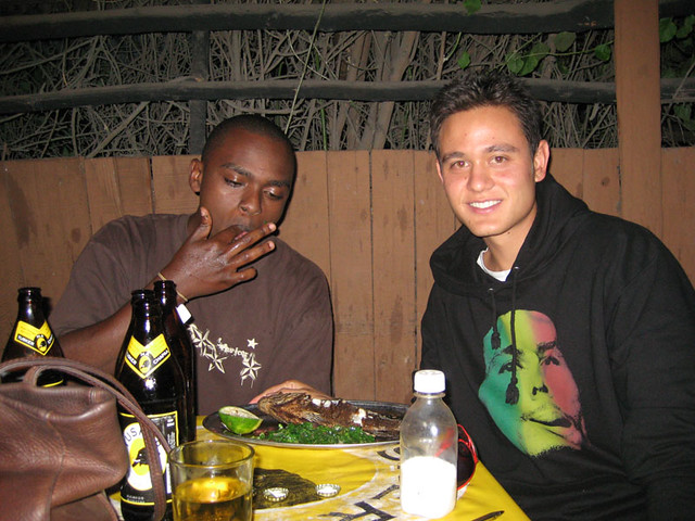 The author (right) Hanging Out at a Local Bar / Restaurant in Nairobi
