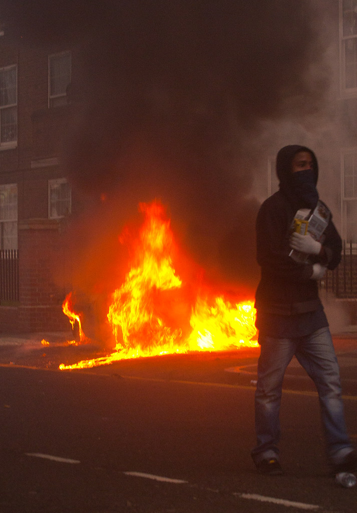 Carrying his loot from the Corner Shop - Hackney Riots - London Riots 8th August 2011