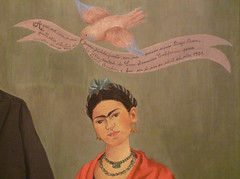 Frida Kahlo, Frieda and Diego Rivera with detail of bird and banner