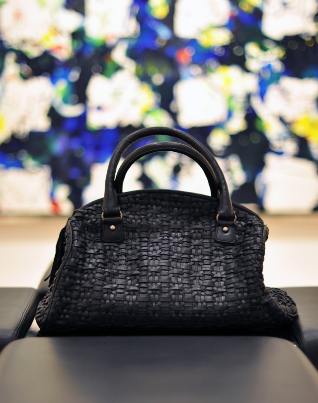 woven black leather bag