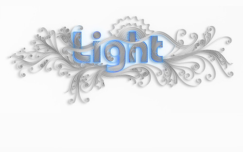 digital quilled design of word Light with white quilled flourishes