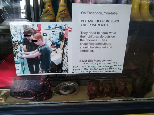 On Facebook, YouTube...PLEASE HELP ME FIND THEIR PARENTS. They need to know what their children do outside their homes. Their shoplifting behaviors should be stopped and corrected. The young man on the photo has made an apology to the store. His photos will be removed when he pays for the products. 