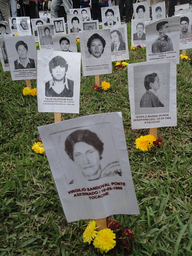 Photos of the disappeared at the Ojo que Llora memorial