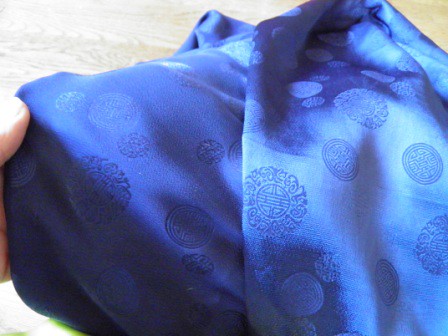 Shiny and matte closeup of navy silk faille