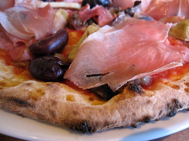 Capriciossa pizza with Prosciutto, artichoke hearts, olives and ham